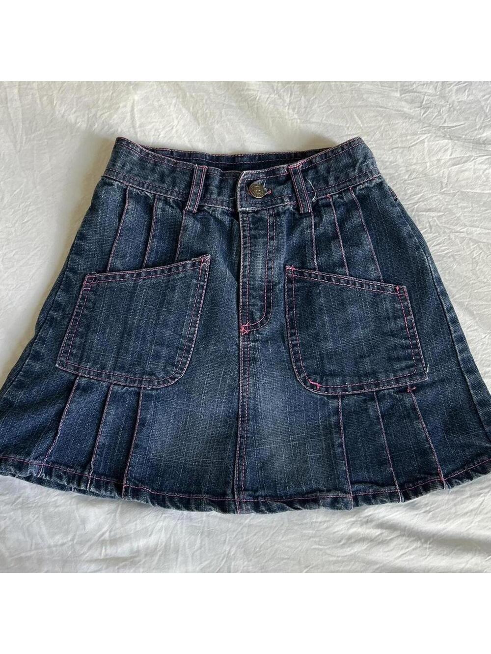 NSI Jeans Co. girls navy denim skirt with pink stitching and pockets
